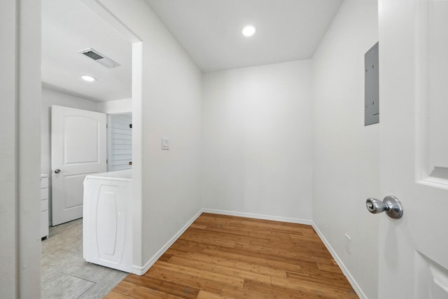 3351 Nicolet Ln, Redding, CA 96001 - laundry area with washer / clothes dryer, light wood finished floors, electric panel, and recessed lighting