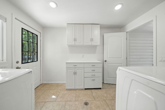 3351 Nicolet Ln, Redding, CA 96001 - laundry area with light tile patterned flooring, recessed lighting, independent washer and dryer, and cabinet space