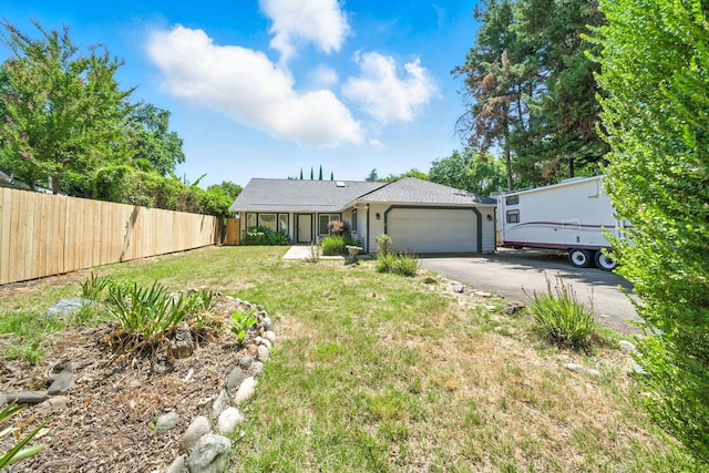 3385 Pioneer Ln, Redding, CA 96001 - view of front of property with an attached garage and driveway