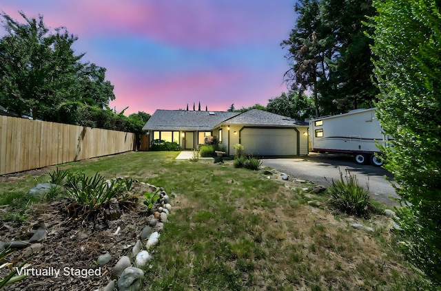 3385 Pioneer Ln, Redding, CA 96001 - view of front facade with asphalt driveway and a garage