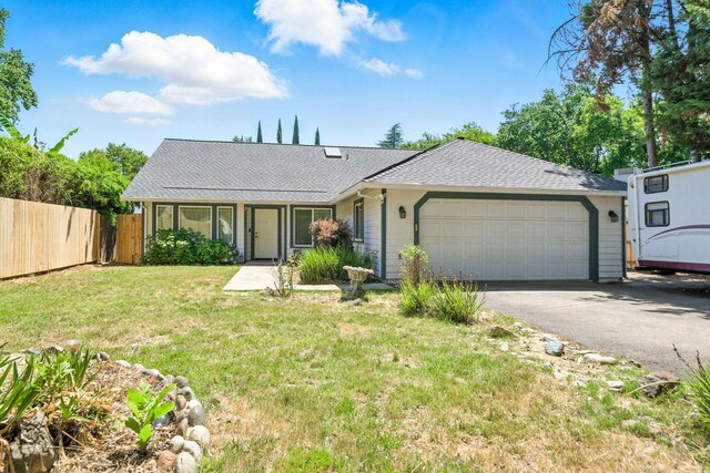 3385 Pioneer Ln, Redding, CA 96001 - ranch-style house with a garage, asphalt driveway, and roof with shingles