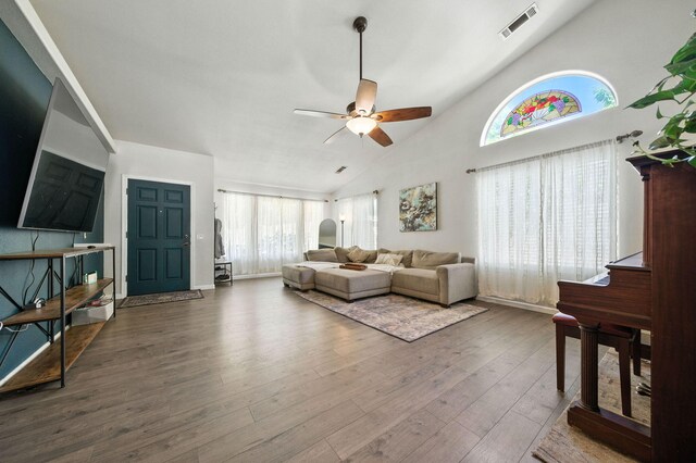 3385 Pioneer Ln, Redding, CA 96001 - living room featuring ceiling fan, wood finished floors, and high vaulted ceiling