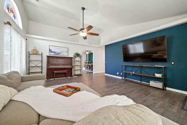 3385 Pioneer Ln, Redding, CA 96001 - living area with wood finished floors, vaulted ceiling, and a ceiling fan