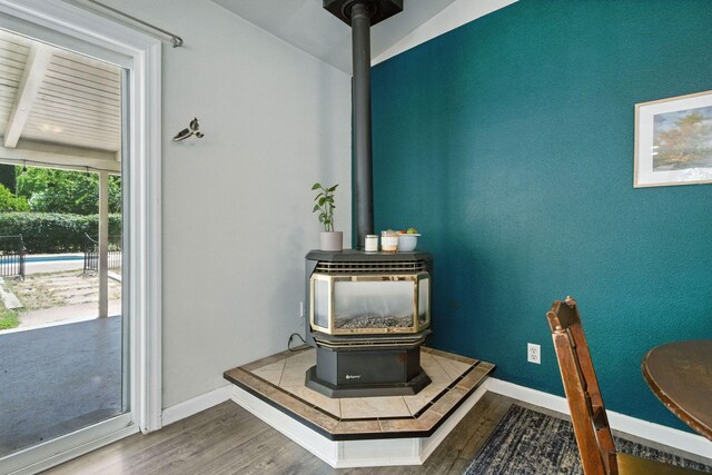 3385 Pioneer Ln, Redding, CA 96001 - detailed view of a wood stove and wood finished floors