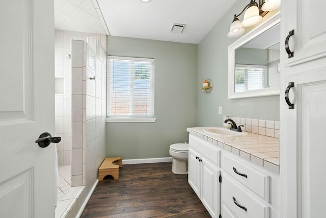 3385 Pioneer Ln, Redding, CA 96001 - bathroom with a walk in shower, vanity, and wood finished floors