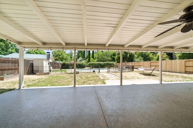 3385 Pioneer Ln, Redding, CA 96001 - fenced backyard with a patio area and a ceiling fan