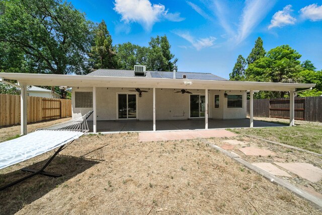 3385 Pioneer Ln, Redding, CA 96001 - back of house featuring a ceiling fan, a fenced backyard, a patio area, and stucco siding