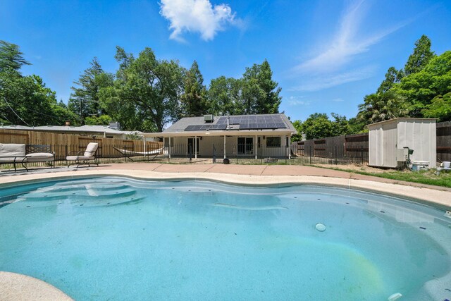 3385 Pioneer Ln, Redding, CA 96001 - view of swimming pool with a fenced backyard and a patio area