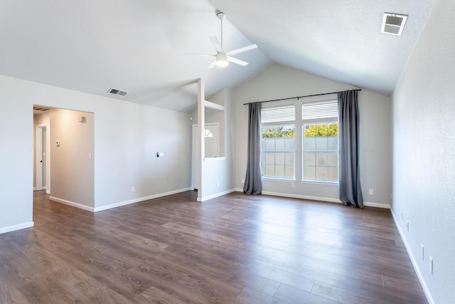 2773 Crystal Tree Dr, Redding, CA 96001 - unfurnished living room featuring a ceiling fan, vaulted ceiling, and dark wood finished floors