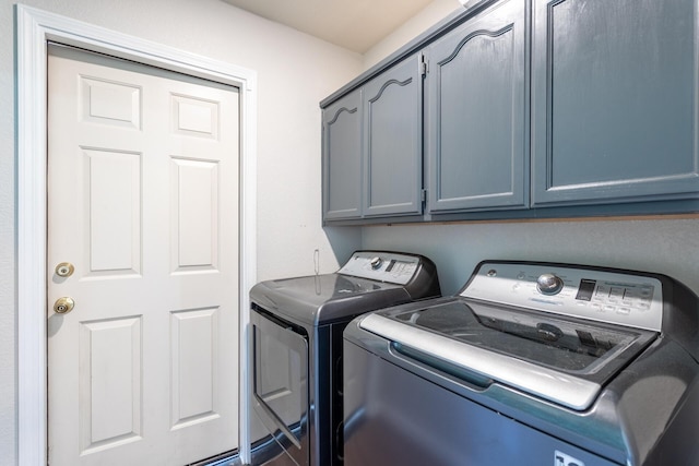 2773 Crystal Tree Dr, Redding, CA 96001 - laundry area with washer and dryer and cabinet space