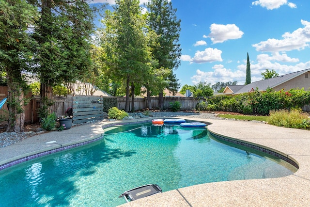 2773 Crystal Tree Dr, Redding, CA 96001 - view of swimming pool with a fenced backyard