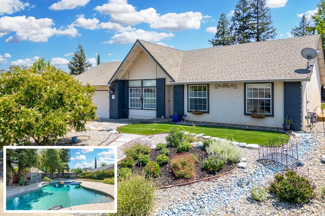 2773 Crystal Tree Dr, Redding, CA 96001 - view of front of house with a shingled roof, a pool with connected hot tub, and brick siding