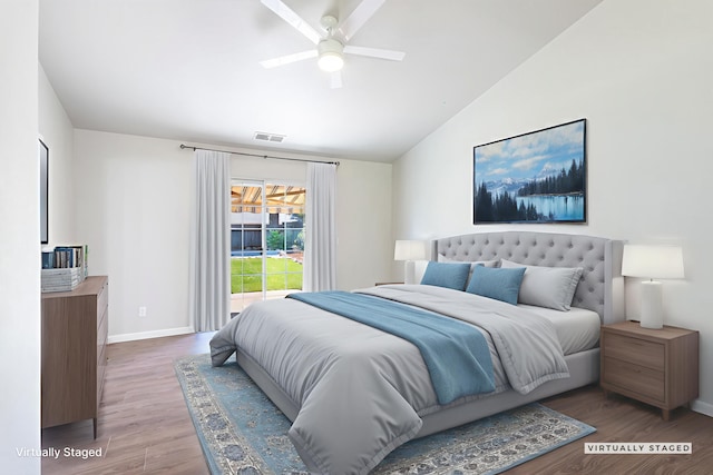 2773 Crystal Tree Dr, Redding, CA 96001 - bedroom featuring wood finished floors, lofted ceiling, and a ceiling fan