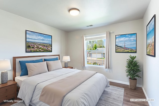 2773 Crystal Tree Dr, Redding, CA 96001 - bedroom featuring wood finished floors and baseboards
