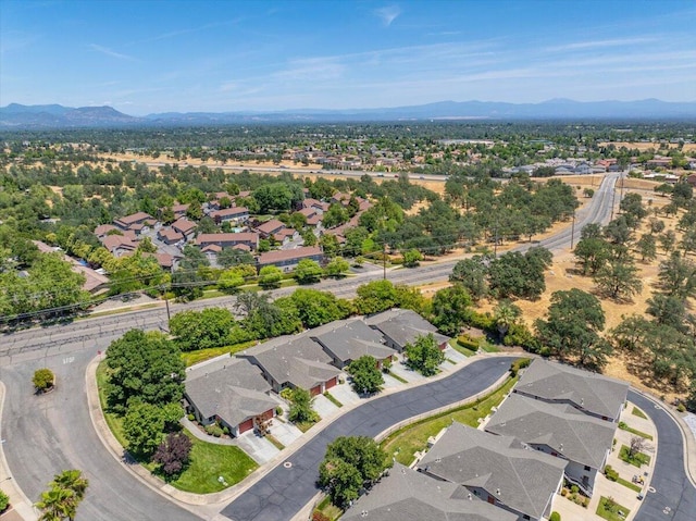 732 Stonebriar Trl, Redding, CA 96003 - aerial overview of property's location featuring a mountain backdrop and nearby suburban area