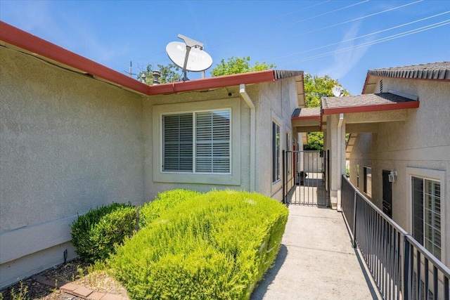 732 Stonebriar Trl, Redding, CA 96003 - entrance to property featuring a gate and stucco siding