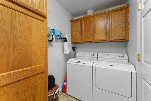732 Stonebriar Trl, Redding, CA 96003 - laundry room with cabinet space and washer and dryer