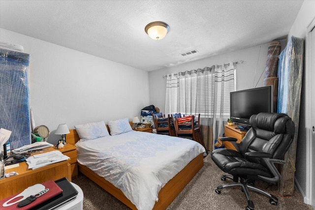 732 Stonebriar Trl, Redding, CA 96003 - bedroom featuring carpet floors, a desk, and a textured ceiling