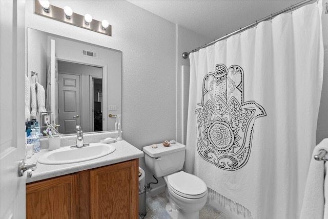 732 Stonebriar Trl, Redding, CA 96003 - full bath with vanity, tile patterned floors, a shower with curtain, and a textured wall