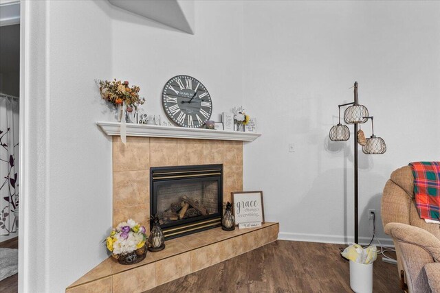 726 Stonebriar Trl, Redding, CA 96003 - detailed view of wood finished floors and a tiled fireplace
