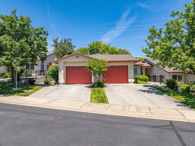 726 Stonebriar Trl, Redding, CA 96003 - single story home featuring a garage, concrete driveway, and stucco siding