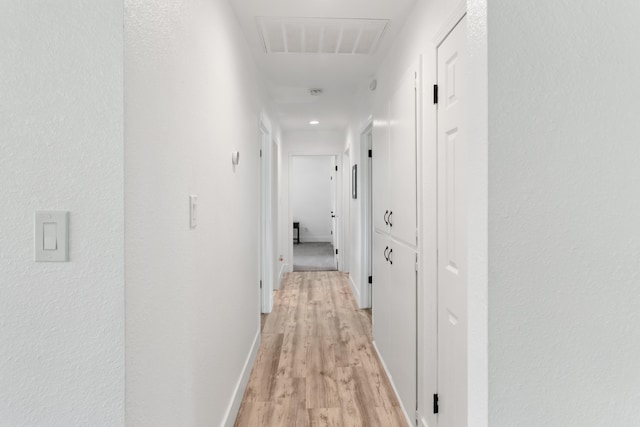 4135 Oro St, Redding, CA 96001 - corridor with light wood-style flooring and baseboards