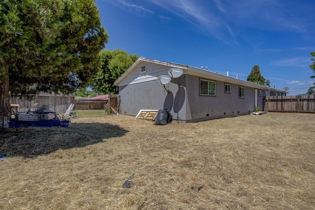 37153/55 Siskiyou St, Burney, CA 96028 - rear view of house with crawl space and a fenced backyard