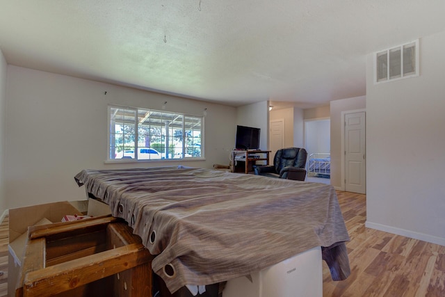 37153/55 Siskiyou St, Burney, CA 96028 - bedroom featuring light wood-type flooring and baseboards