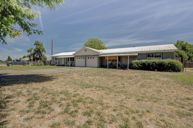 37153/55 Siskiyou St, Burney, CA 96028 - ranch-style house featuring a garage and driveway