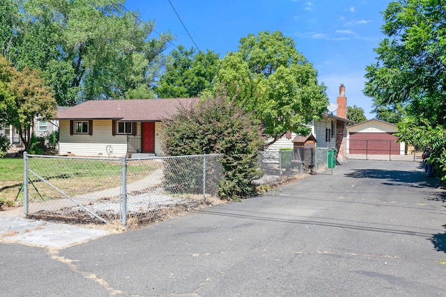 5858 Deschutes Rd, Anderson, CA 96007 - view of front of home featuring a fenced front yard and an outbuilding