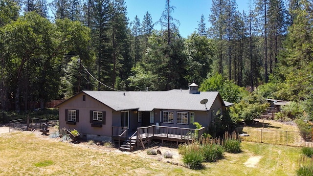 290 Mountain View Dr, Lewiston, CA 96052 - view of front of home featuring crawl space, a deck, and a view of trees