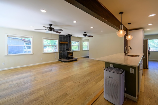 290 Mountain View Dr, Lewiston, CA 96052 - kitchen with a wood stove, healthy amount of natural light, recessed lighting, light wood finished floors, and open floor plan