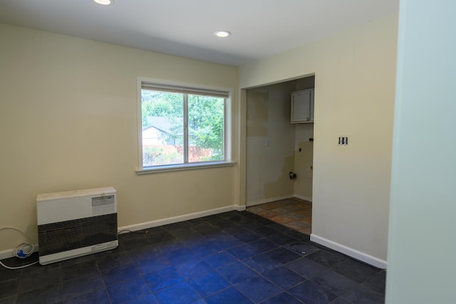 290 Mountain View Dr, Lewiston, CA 96052 - unfurnished room with heating unit, recessed lighting, and dark stone finish flooring