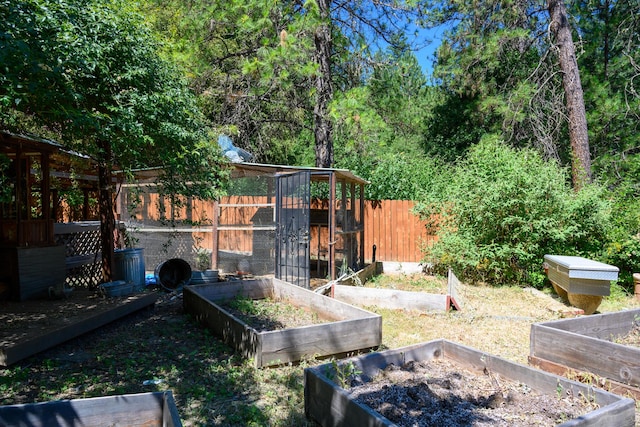 290 Mountain View Dr, Lewiston, CA 96052 - view of yard featuring a vegetable garden, an outbuilding, and exterior structure