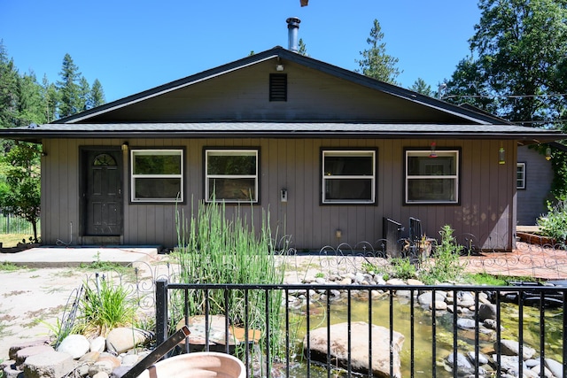 290 Mountain View Dr, Lewiston, CA 96052 - view of front of home featuring a garden pond and a shingled roof