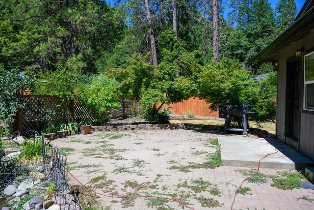 290 Mountain View Dr, Lewiston, CA 96052 - fenced backyard featuring a patio area