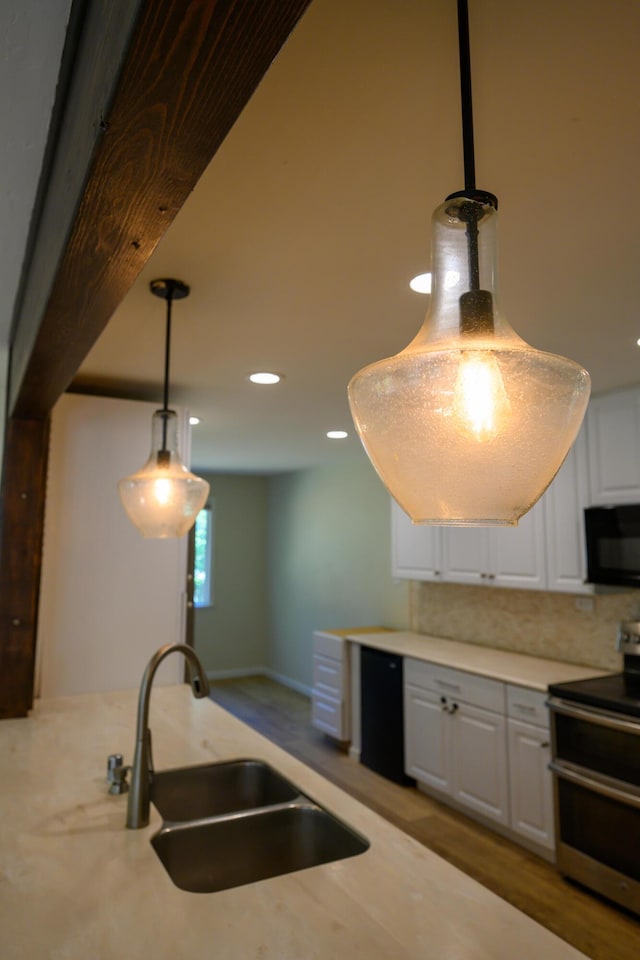 290 Mountain View Dr, Lewiston, CA 96052 - kitchen featuring black appliances, white cabinetry, light countertops, hanging light fixtures, and recessed lighting