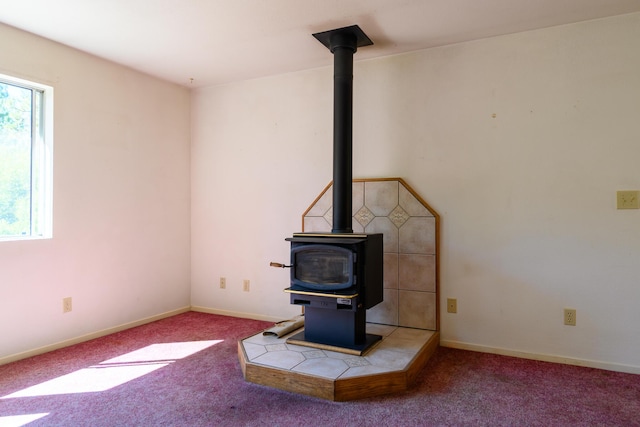 2307 Goose Ranch Rd, Lewiston, CA 96052 - unfurnished living room with a wood stove and carpet floors
