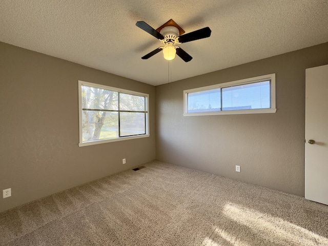 1020 Gibralter Rd, Redding, CA 96003 - carpeted spare room featuring ceiling fan and a textured ceiling