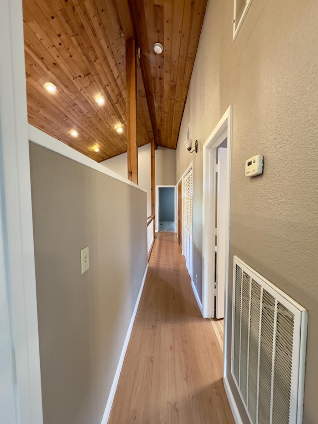 1020 Gibralter Rd, Redding, CA 96003 - corridor with wooden ceiling, wood finished floors, a textured wall, and recessed lighting