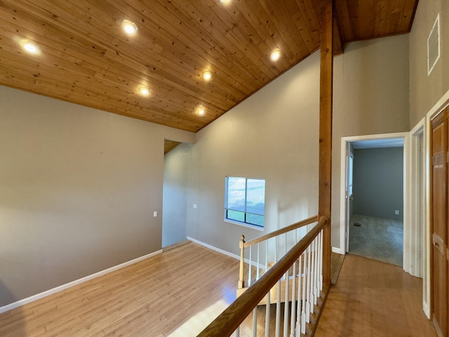 1020 Gibralter Rd, Redding, CA 96003 - corridor featuring wooden ceiling, recessed lighting, high vaulted ceiling, light wood finished floors, and an upstairs landing
