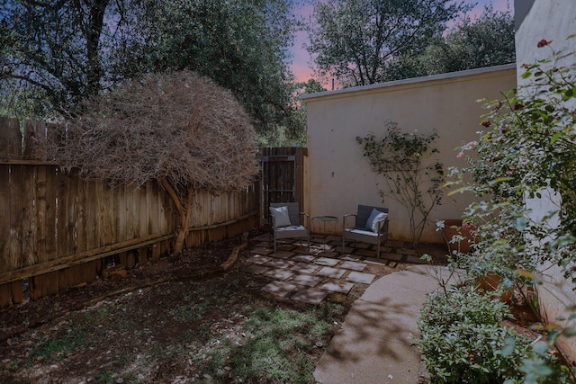 21552157 Butte St, Redding, CA 96003 - yard at dusk featuring a patio area