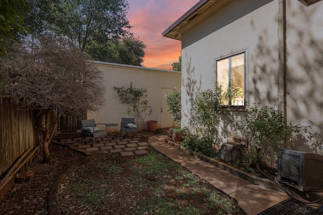 21552157 Butte St, Redding, CA 96003 - yard at dusk featuring a patio area