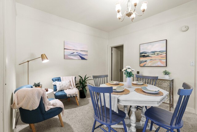 21552157 Butte St, Redding, CA 96003 - dining area featuring carpet flooring and a chandelier