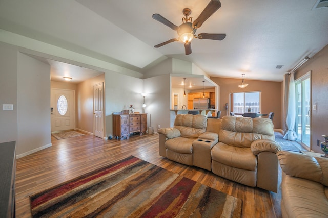 3388 Oak St, Anderson, CA 96007 - living room featuring wood finished floors, vaulted ceiling, and ceiling fan