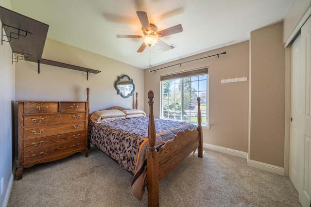 3388 Oak St, Anderson, CA 96007 - bedroom featuring light colored carpet, a closet, and a ceiling fan