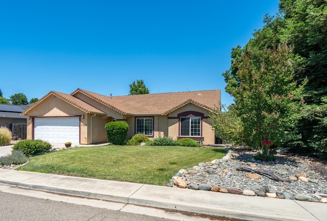 3388 Oak St, Anderson, CA 96007 - ranch-style home featuring a garage, stucco siding, a front yard, and concrete driveway