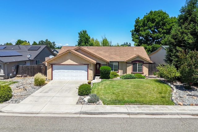 3388 Oak St, Anderson, CA 96007 - ranch-style home with an attached garage, stucco siding, and driveway