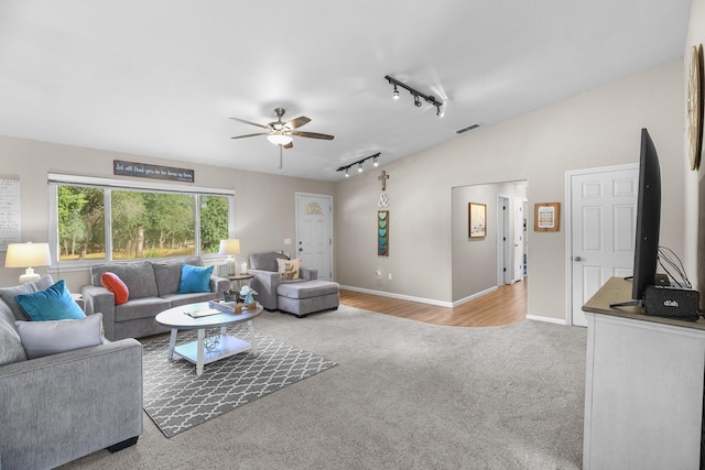 13354 Kings Way, Redding, CA 96003 - living room with rail lighting, light colored carpet, and ceiling fan