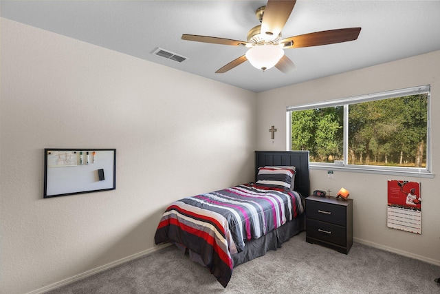 13354 Kings Way, Redding, CA 96003 - bedroom with light colored carpet and a ceiling fan